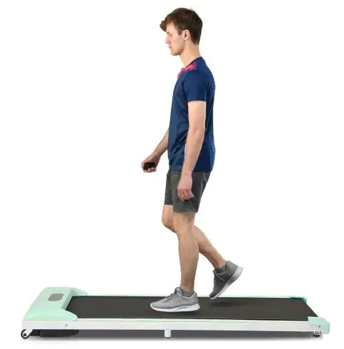 Compact green under-desk treadmill with remote control, LED display & quiet motor for home & office fitness.